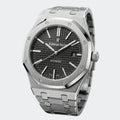 Octagonal steel automatic watch with textured dial and integrated bracelet