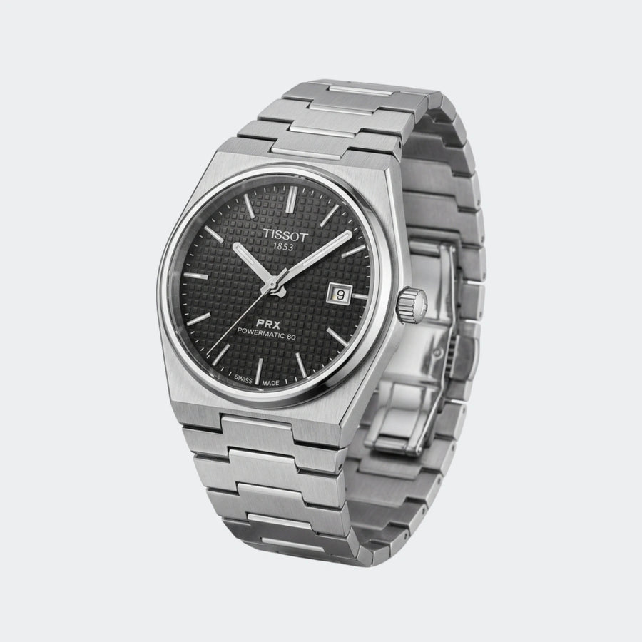 Thin steel quartz watch with black dial and integrated tapering bracelet